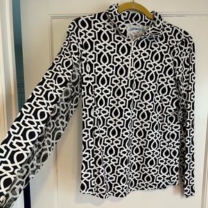 Long-sleeved golf shirt. Black and white design. Size Medium. NWT.